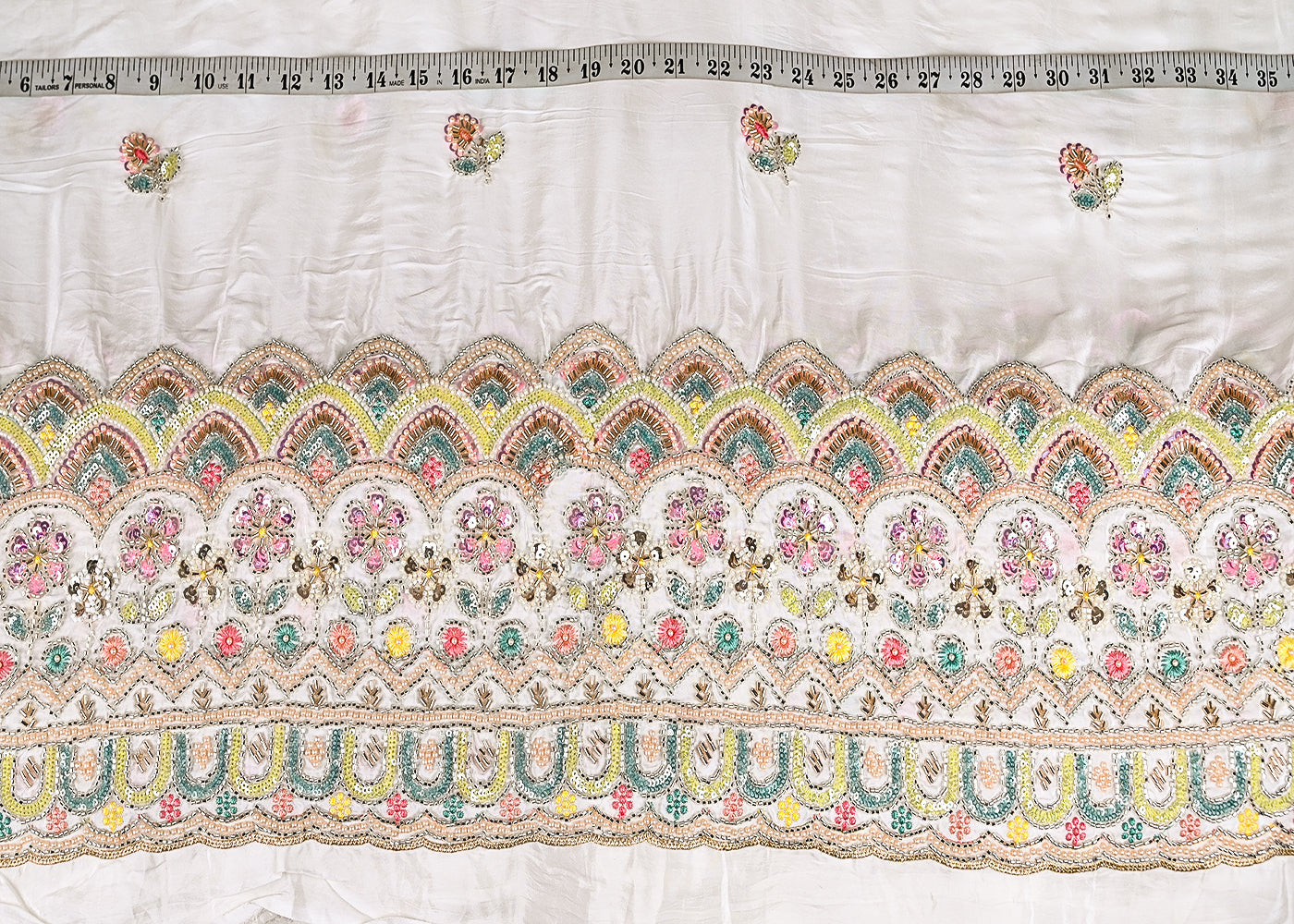 White Crepe Fabric With All Over Katdana, Zari, Bead, Thread And Sequins Work With One Side Border 20258