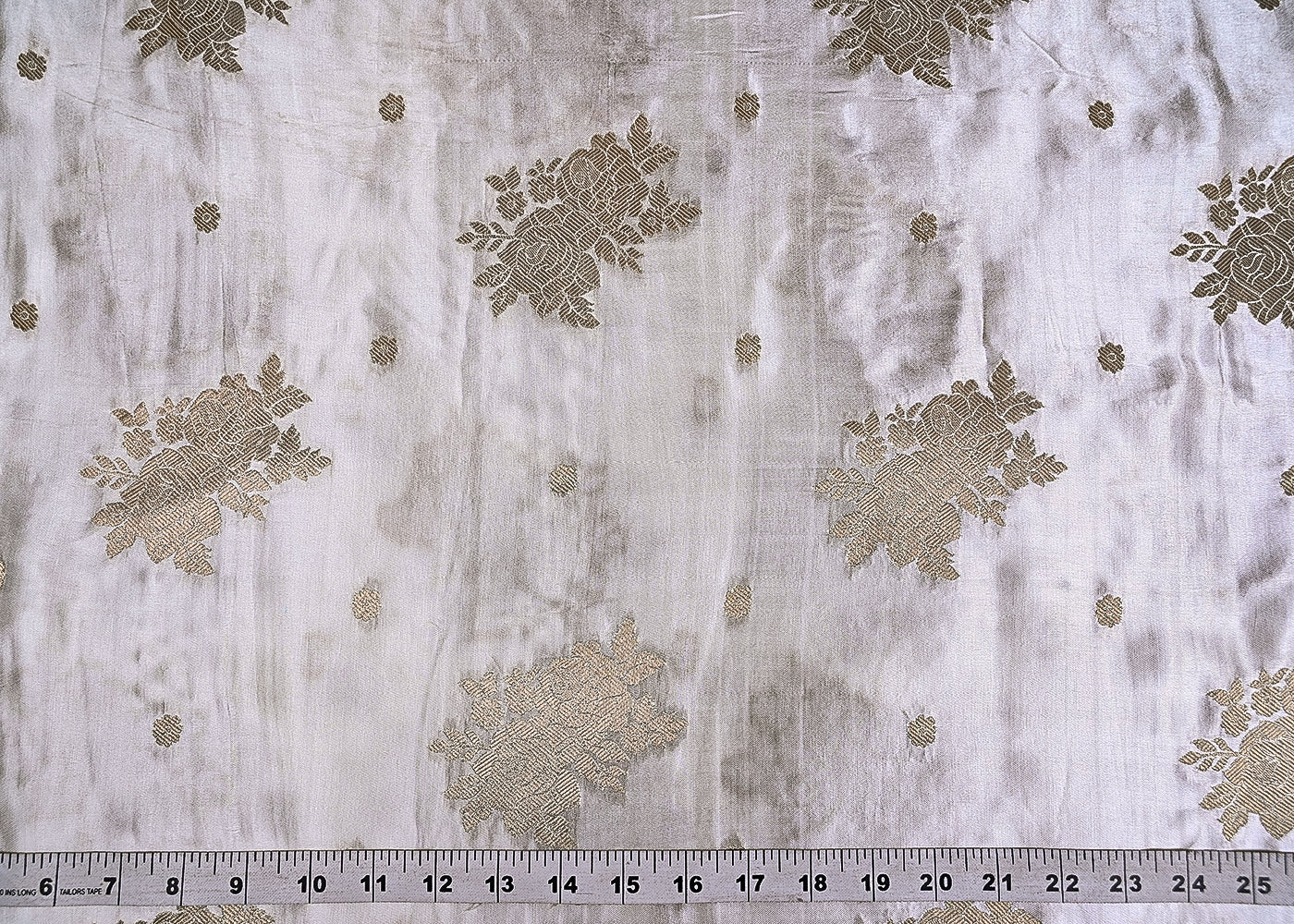 White Satin Fabric With Allover Zari Handloom Buti 20390