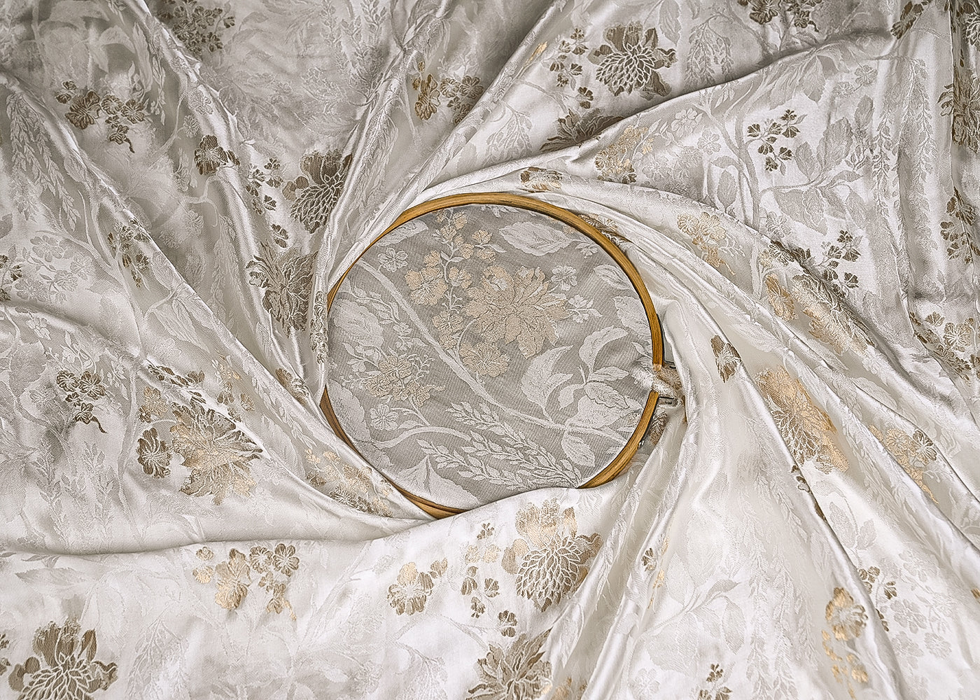 White Satin Fabric With Allover Zari And Thread Handloom Buti 20392