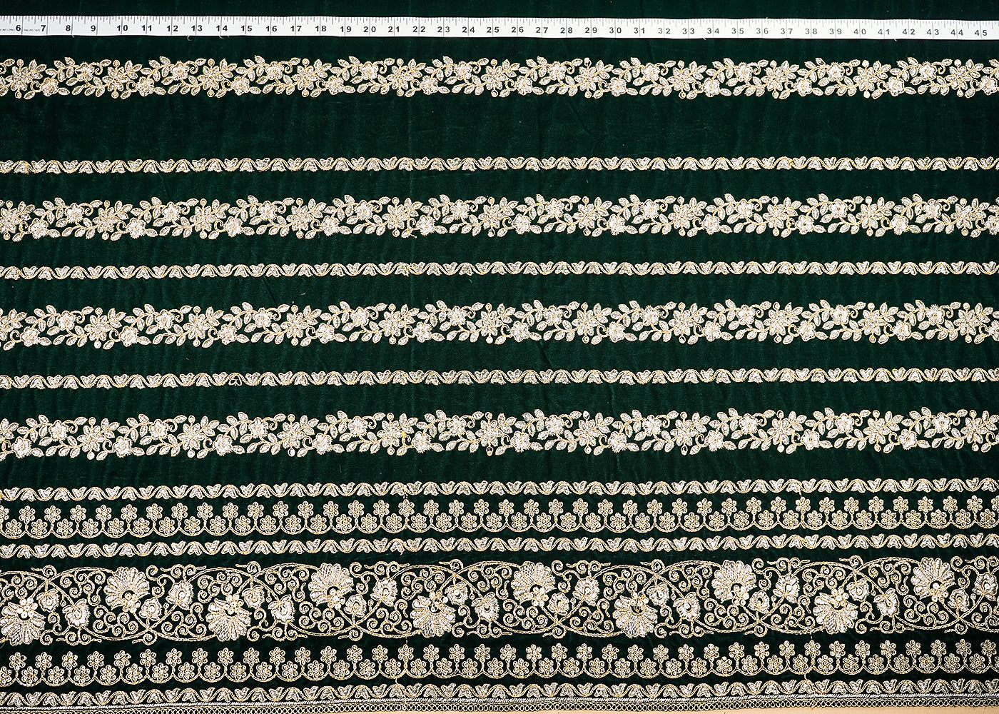 Bottle Green Velvet Fabric With All Over Golden Zari Work And One Side Border 20535