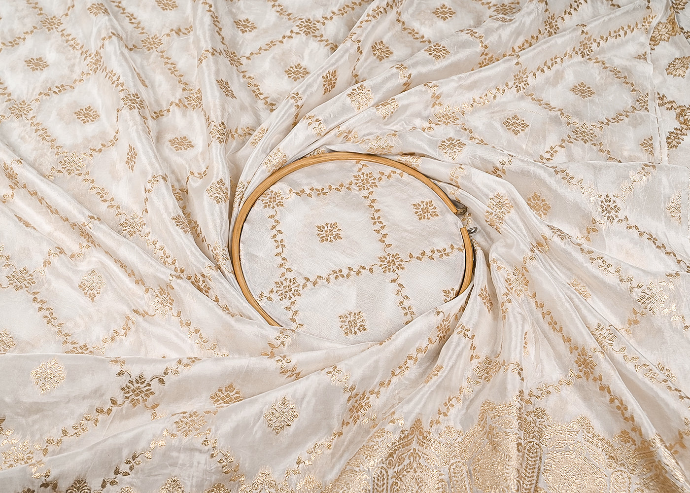 White Crepe Fabric with Allover Zaal Pattern of Golden Zari with One Side Heavy Border 20989