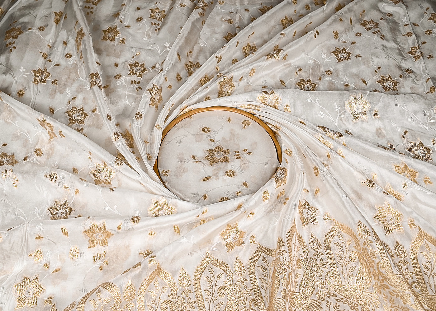 White Crepe Fabric with Allover Floral Pattern of Golden Zari Handloom with One Side Heavy Border 20992