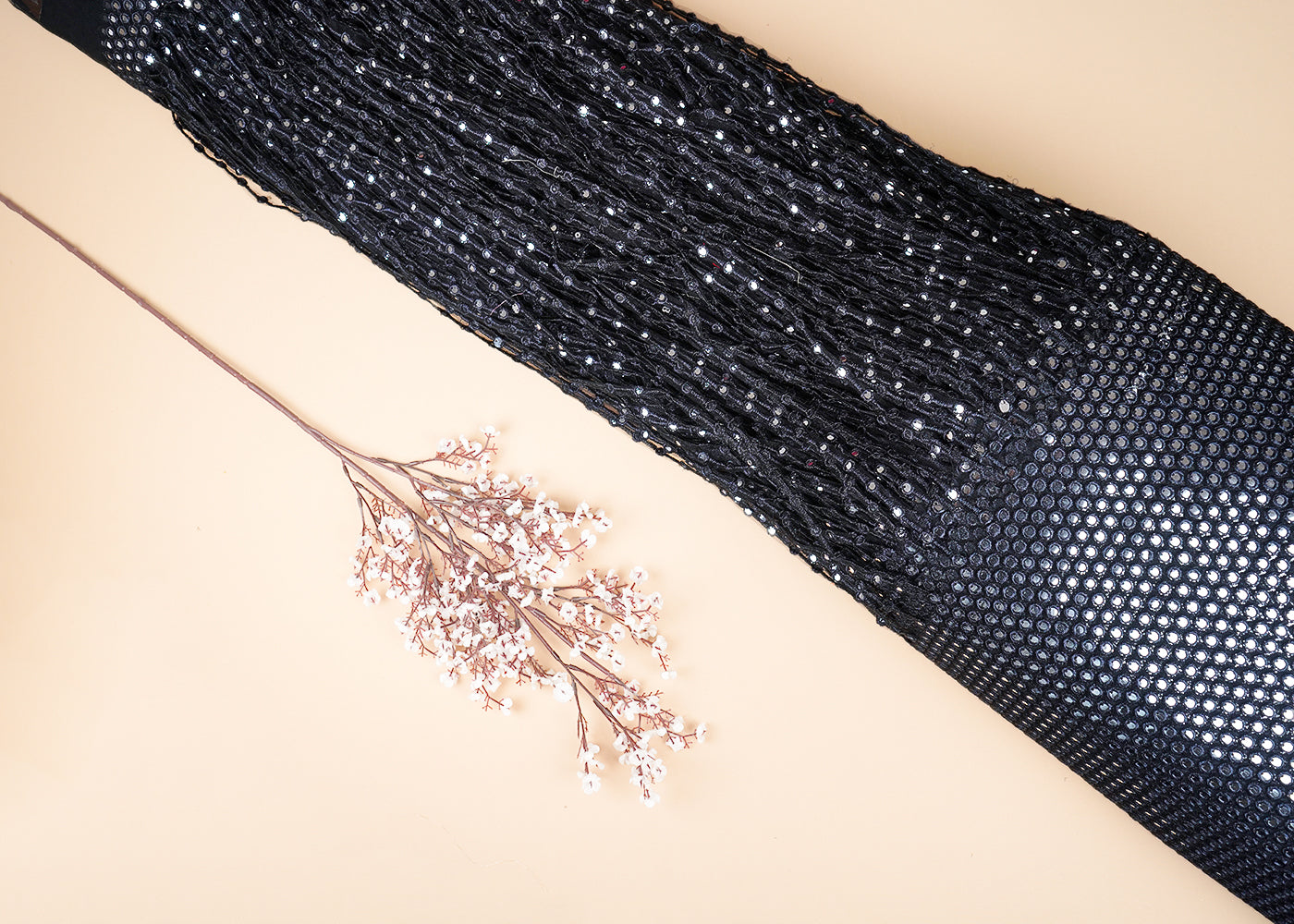 Black Net Fabric With All Over Laser Cutwork And One Side Border 21024