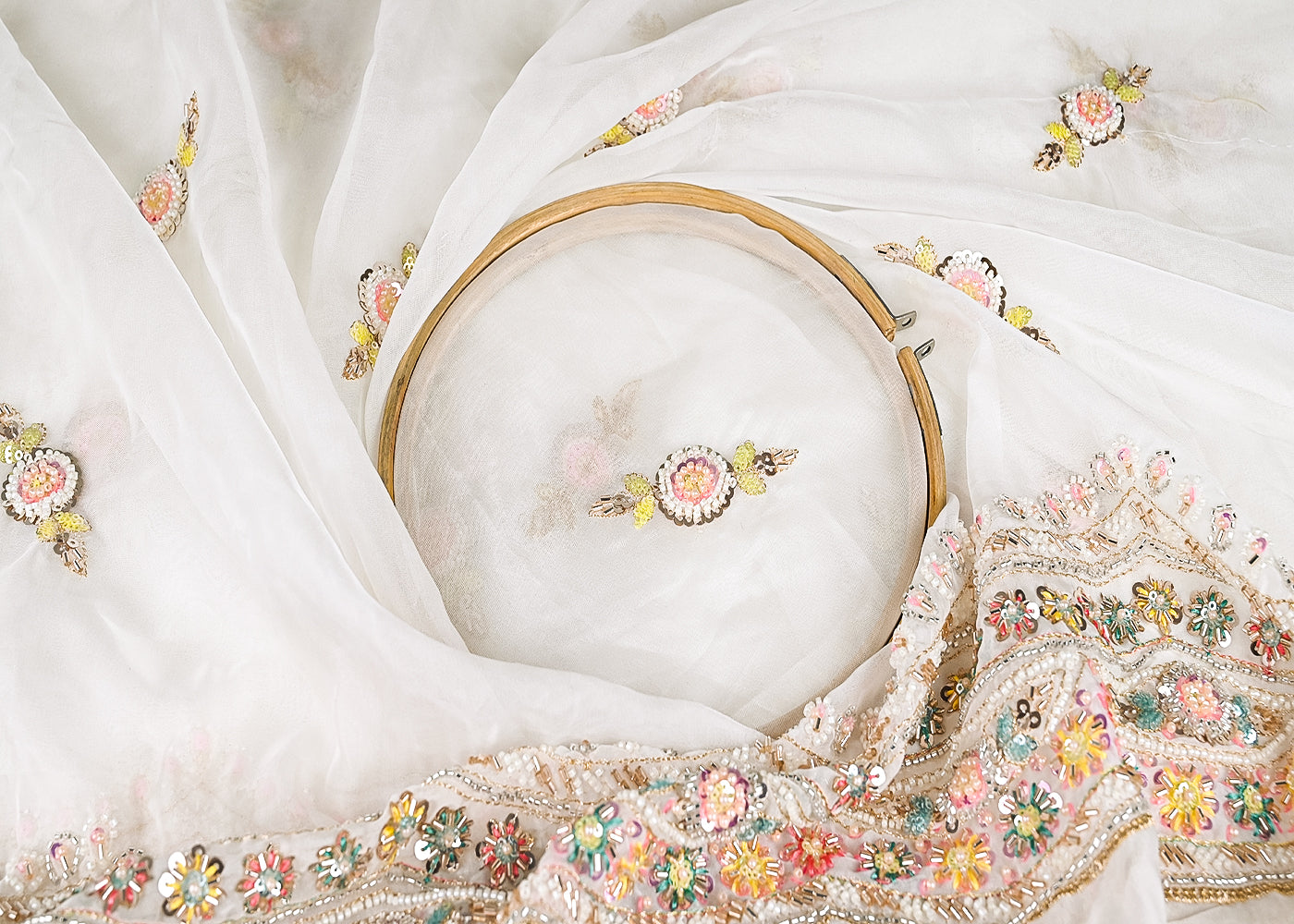 White Organza Fabric With All Over Katdana, Zari, Bead, Thread And Sequins Work With One Side Border 21039