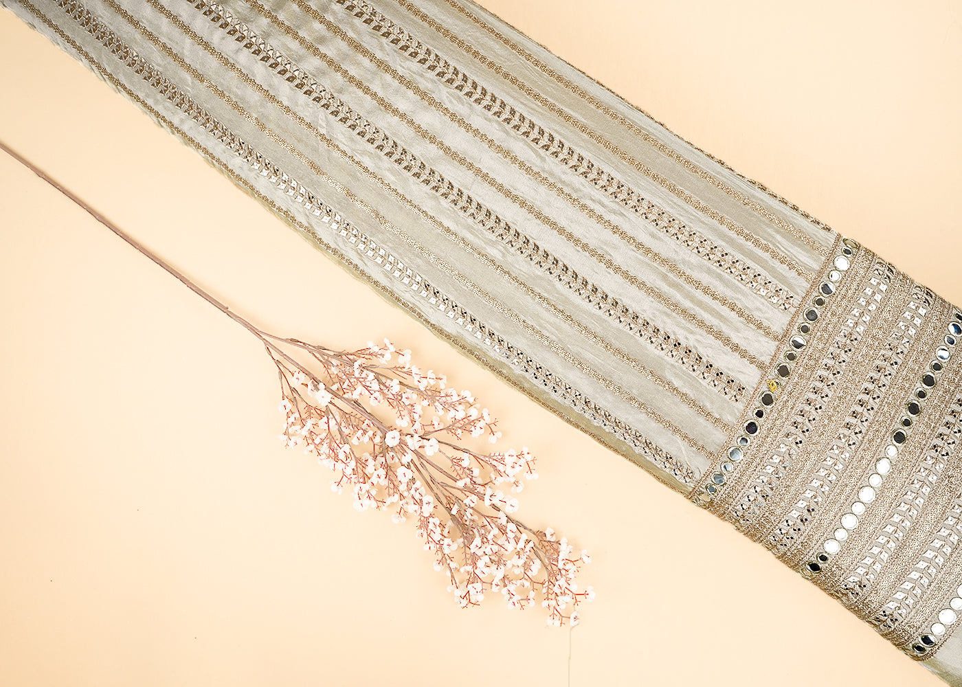 Golden Dyeable Tissue Fabric With All Over Stripes of Zari, Sequins And Faux Mirror Work With One Side Heavy Border 21506