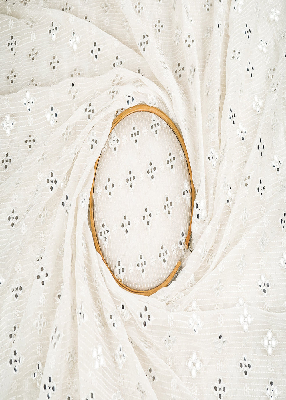White-Dyeable-Georgette-Fabric-With-All-Over-Thread-And-faux-Mirror-Work-21568-close-view