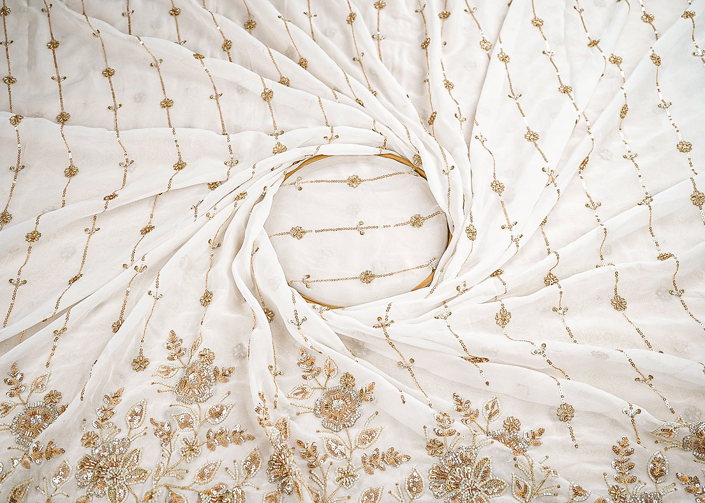 White Dyeable Georgette Fabric With All Over Stripes Of Zari, Sequins, Beads And Katdana With One Side Scalloped Border 21572