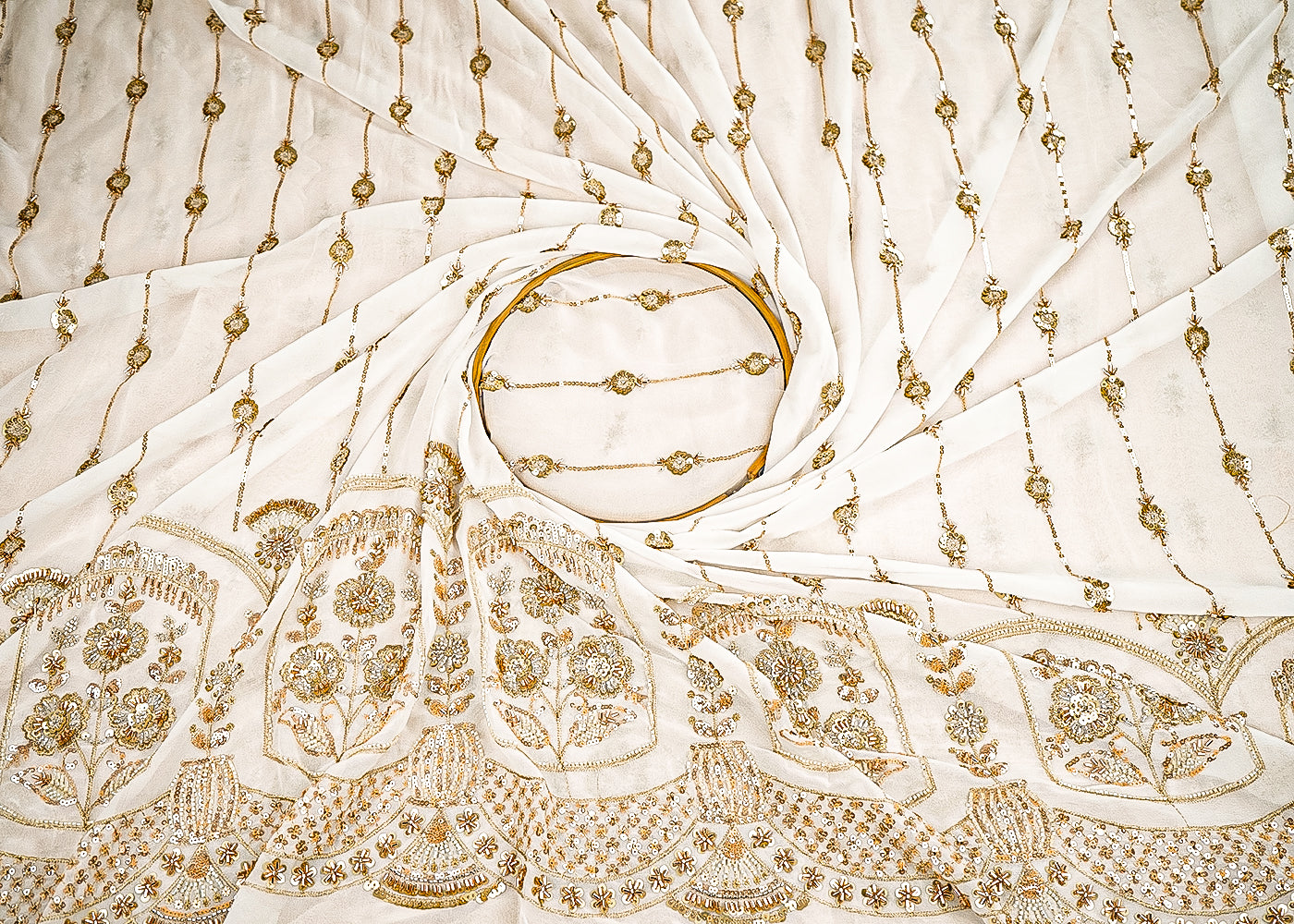 White Dyeable Silk Fabric With All Over Stripes of Zari, Sequins, And Katdana Work With One Side Scalloped Border 21574