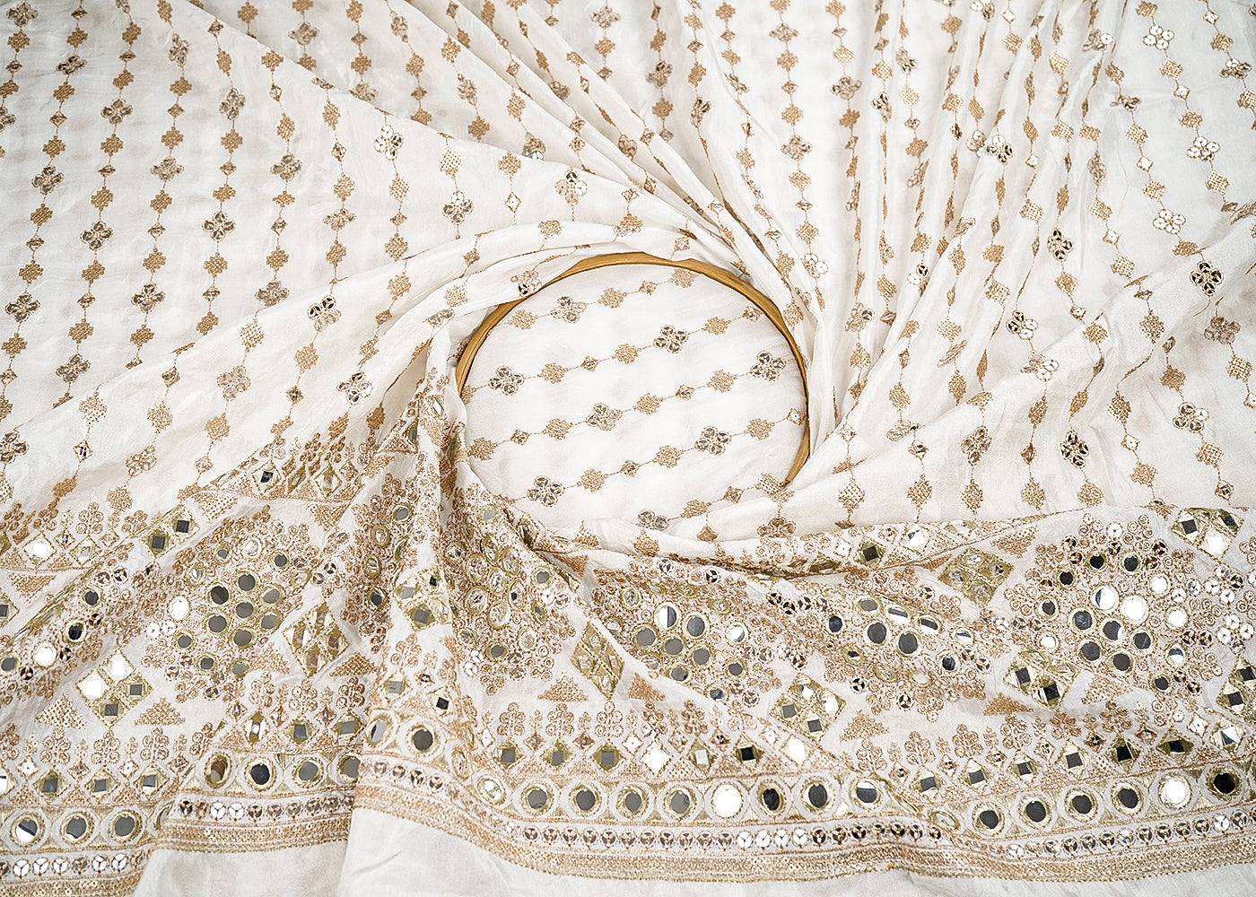 White Dyeable Silk Fabric With All Over Zari, Faux Mirror And Sequins Work With One Side Heavy Border 21586