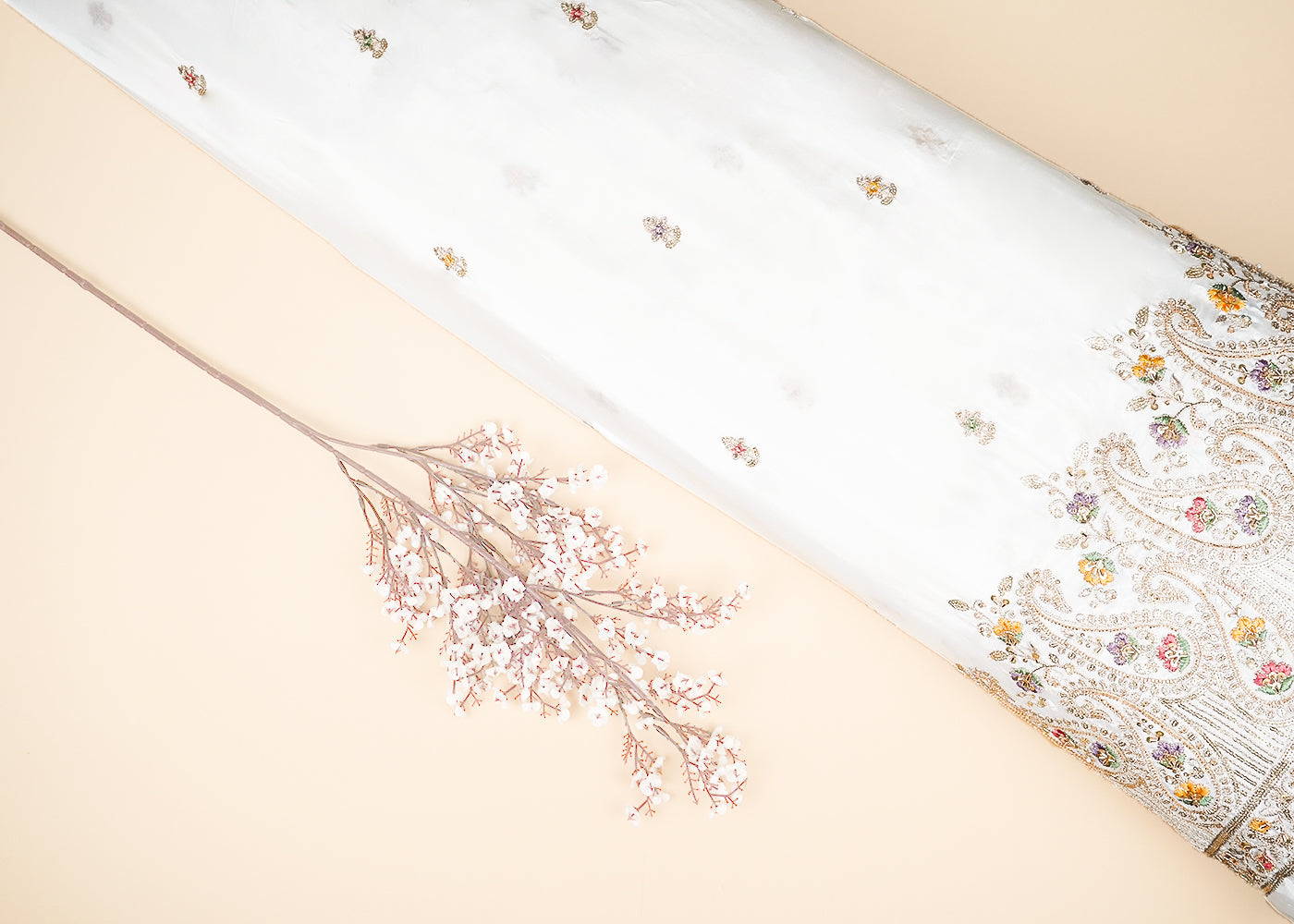 White Dyeable Crepe Fabric With All Over Buti Of Zari, Sequins, Thread And Katdana With One Side Border 21678