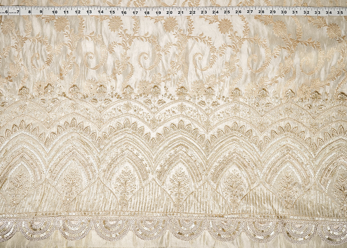Golden Dyeable Tissue Fabric With All Over Zari Handloom And One-Side Sequins And Zari Work Scalloped Border 21698