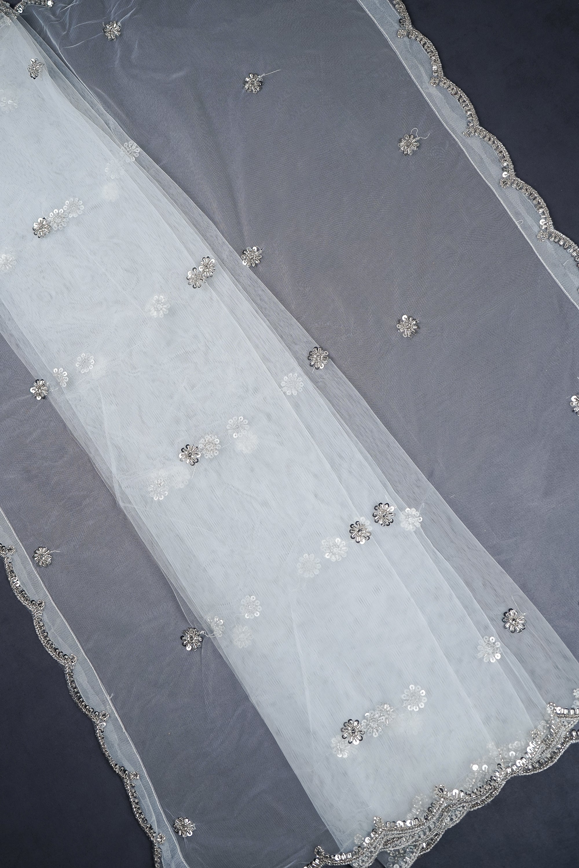 white-net-dupatta-with-all-over-silver-katdana-and-sequins-work-with-scalloped-borders-22179-pleats-view
