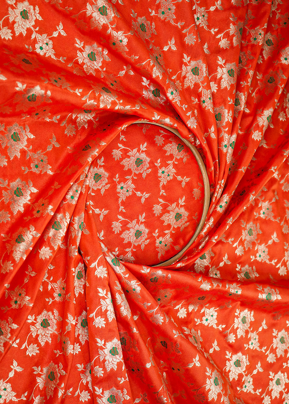Orange-Banarasi-Brocade-Fabric-With-Allover-Thread-And-Golden-Zari-Handloom-close-view
