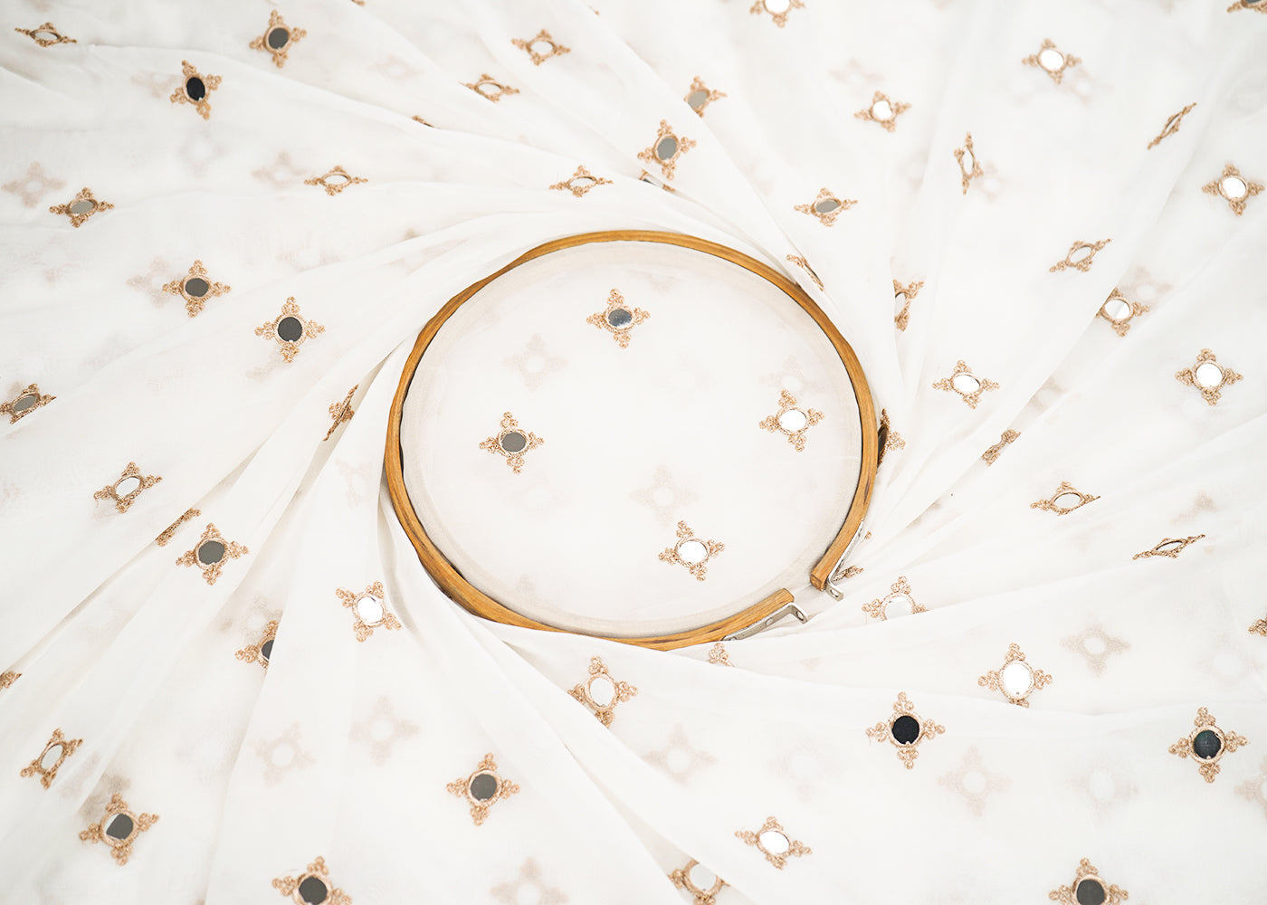 White-Georgette-Fabric-With-All-Over-Buti-Of-Golden-Zari-And-Faux-Mirror-Work-22413-close-view