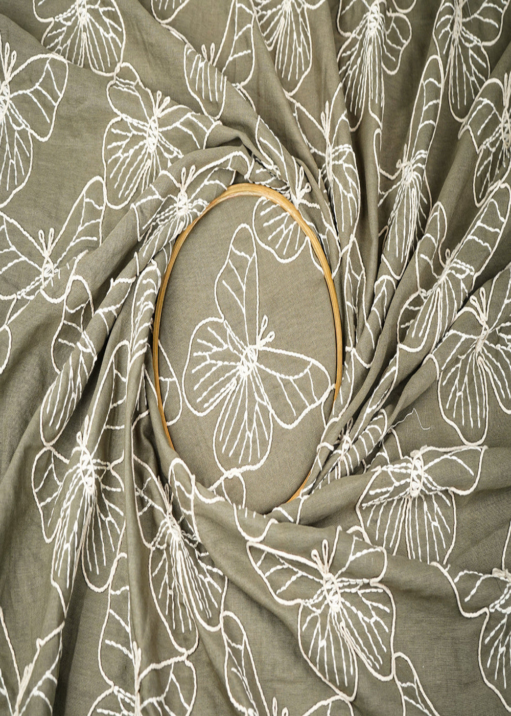 Mehendi-Green-Cotton-Linen-Fabric-With-Allover-Dori-And-Thread-Work-22477-close-view