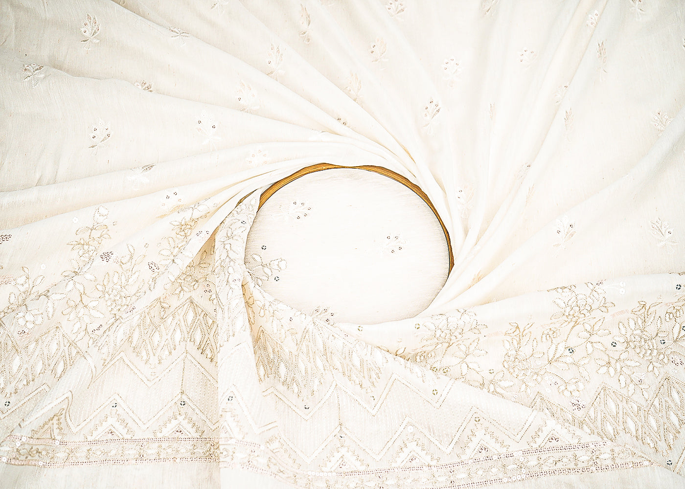 White Dyeable Linen Silk Fabric With Allover Zari, Sequins, Thread And Faux Mirror Work With One Side Border 22506