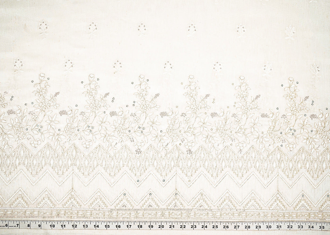 White Dyeable Linen Silk Fabric With Allover Zari, Sequins, Thread And Faux Mirror Work With One Side Border 22506