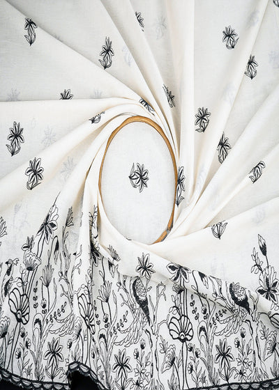 White Dyeable Cambric Cotton Fabric With All Over Buti Of Black Thread Work And Scalloped Border 22779