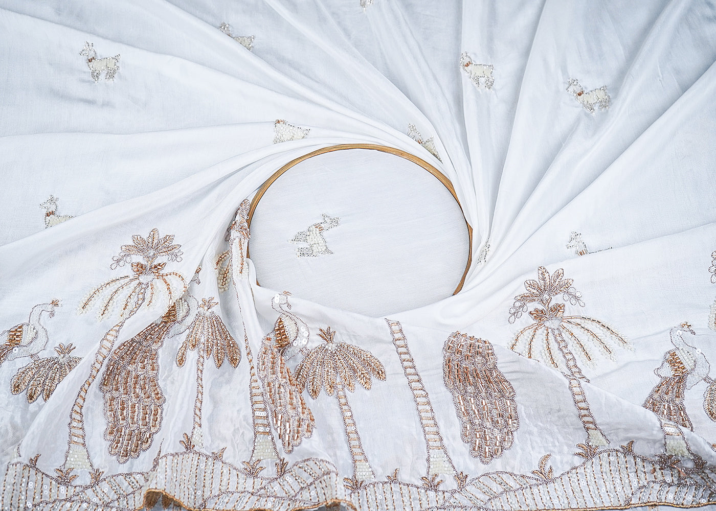 White Muslin Fabric With All Over Zari, Katdana, Bead, Sequins Work And One Side Peacock Motif Border 22905