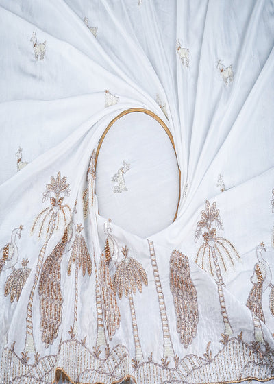 White Dyeable Muslin Fabric With All Over Zari, Katdana, Bead, Sequins Work And One Side Peacock Motif Border 22905