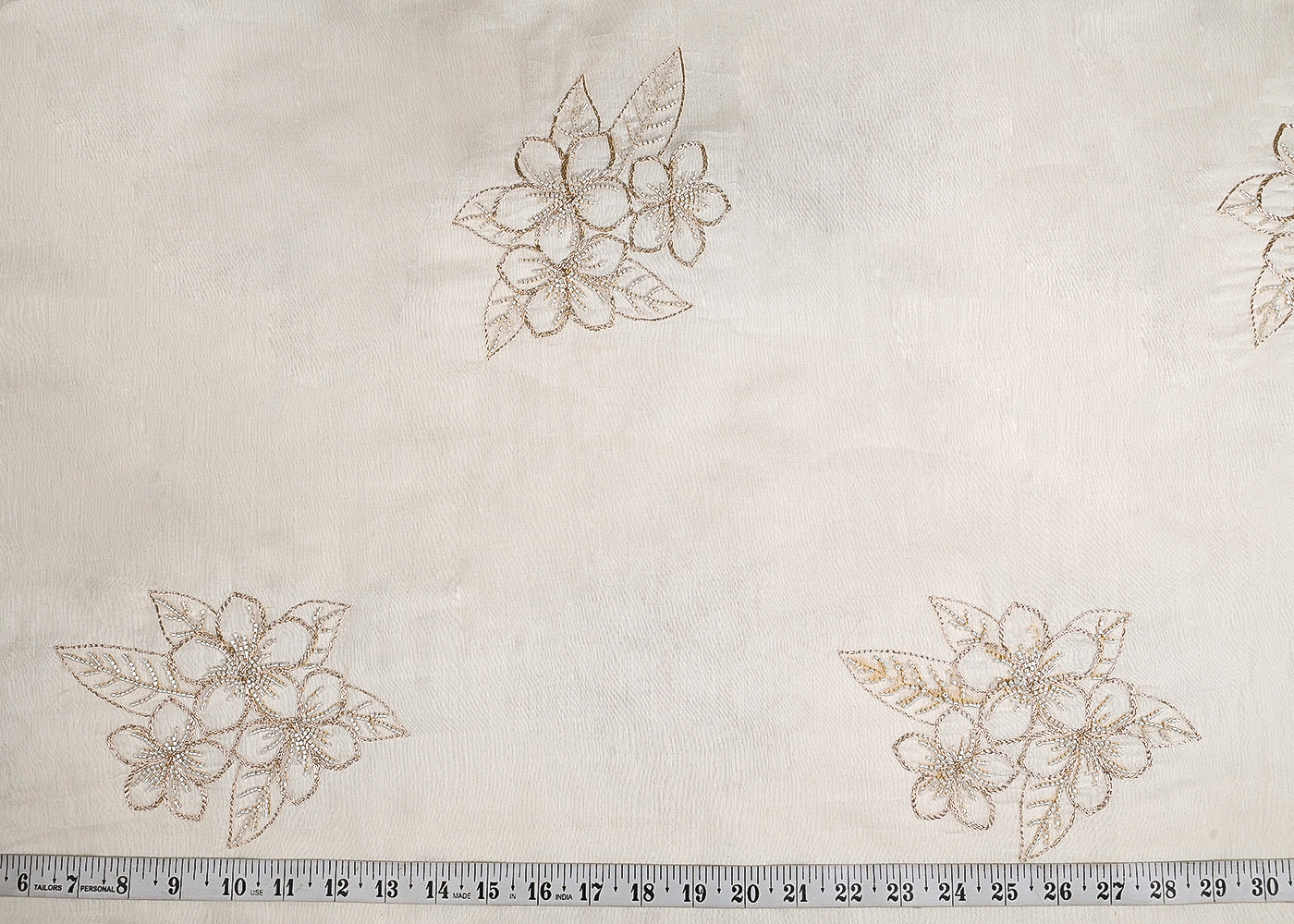 White Dyeable Organza Fabric With All Over Zari And Bead Work 23131