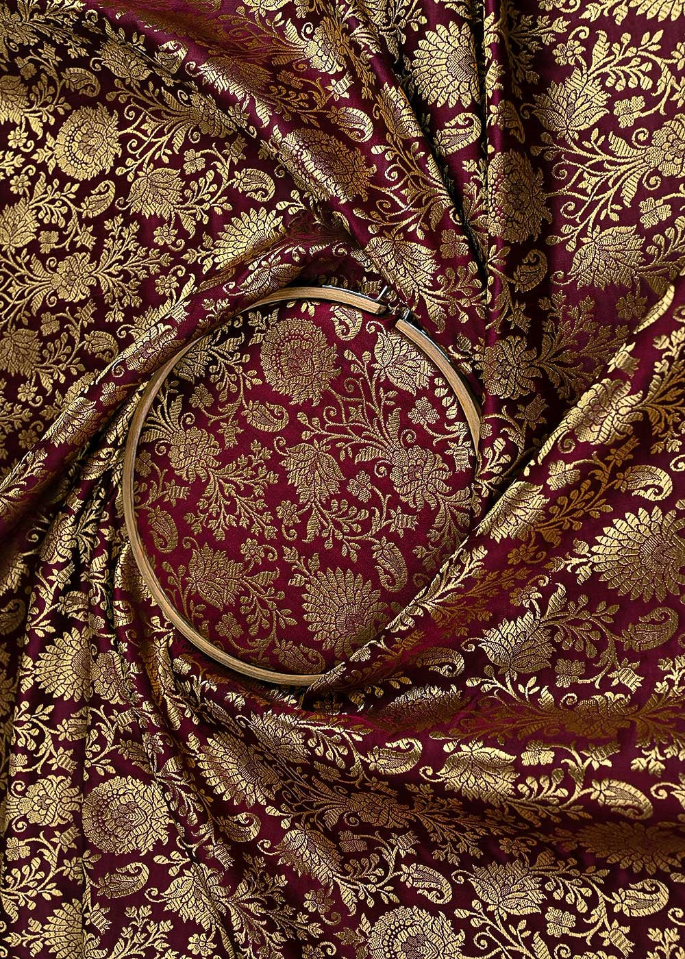 maroon-banarasi-brocade-fabric-with-all-over-golden-zari-handloom-23180-close-view