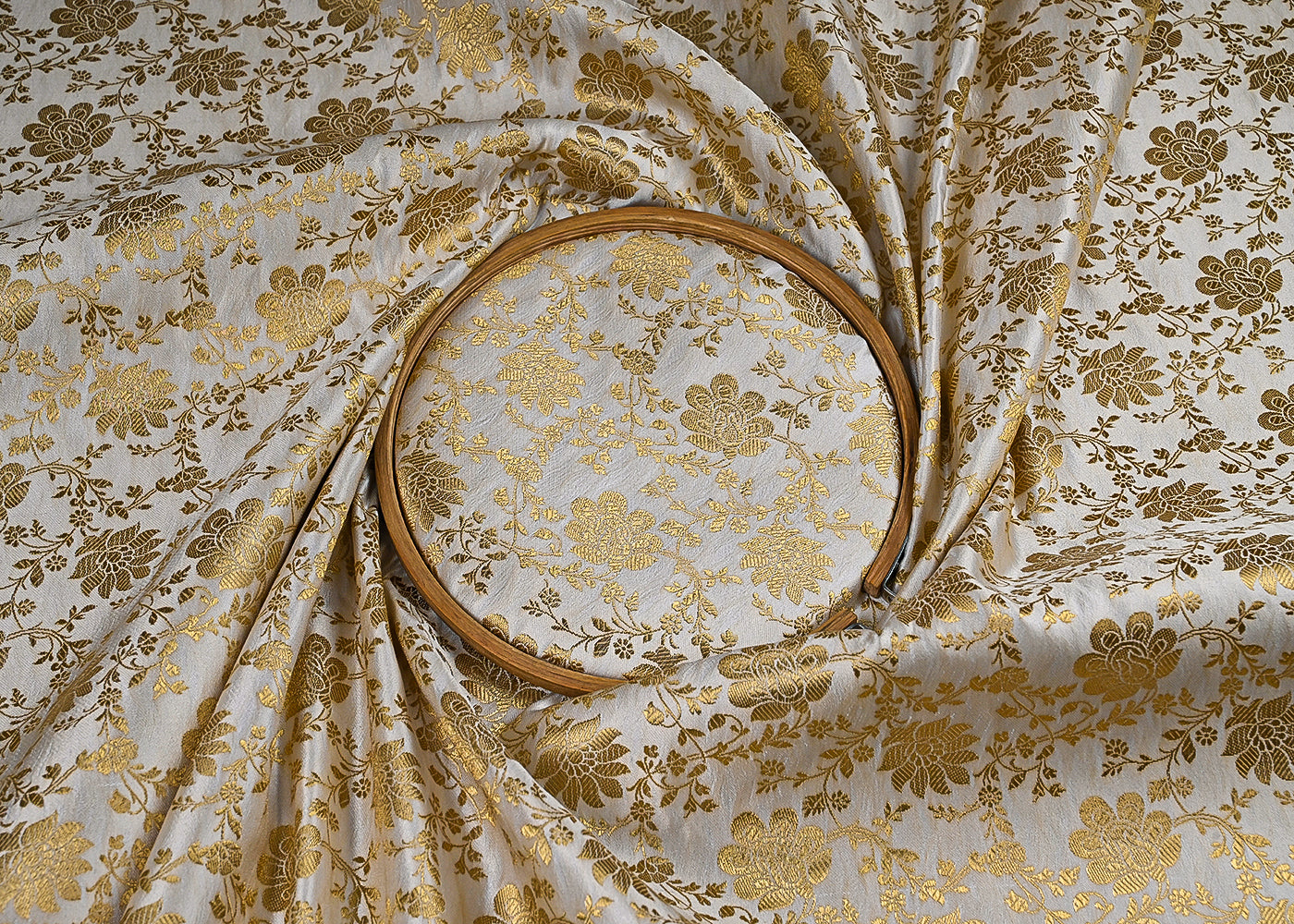 off-white-banarasi-brocade-fabric-with-all-over-golden-zari-handloom-23185-close-view