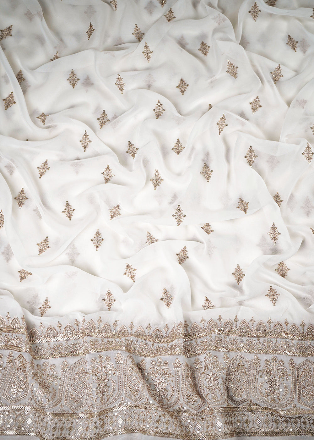White Dyeable Georgette Fabric With All Over Zari And Sequins Work With One Side Border 23929