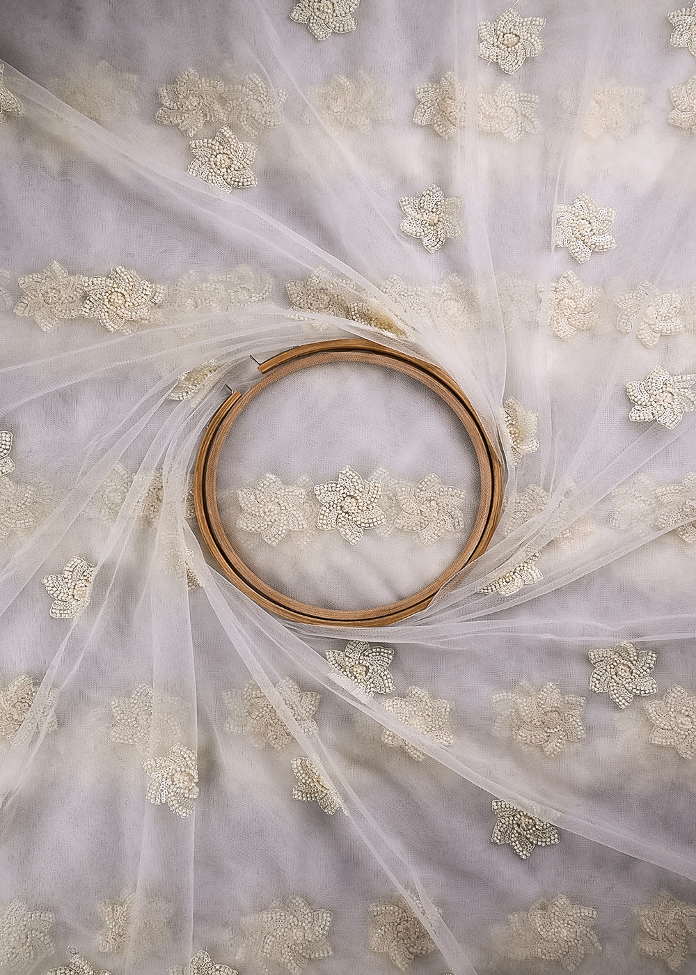 White Dyeable Net Fabric With All Over Buti Of Sequins And Katdana Work 24302