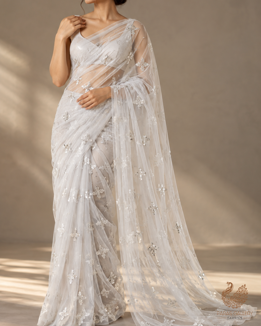 White Dyeable Net Fabric With All Over Buti Of Sequins And Katdana Work 24305