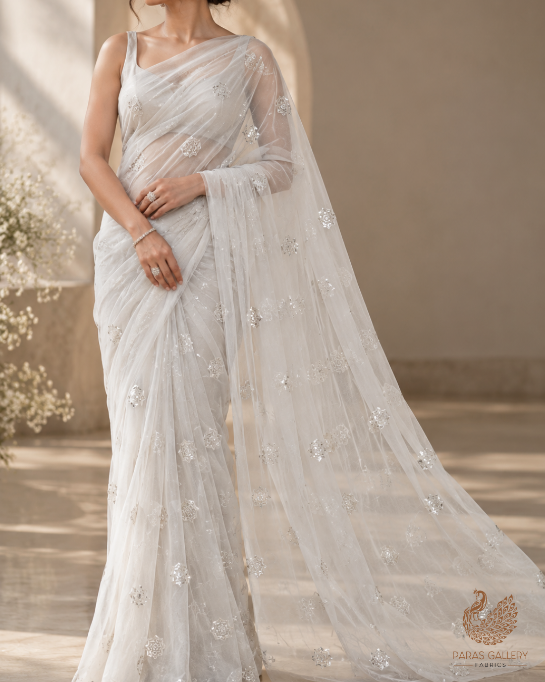 White Dyeable Net Fabric With All Over Buti Of Sequins And Katdana Work 24308