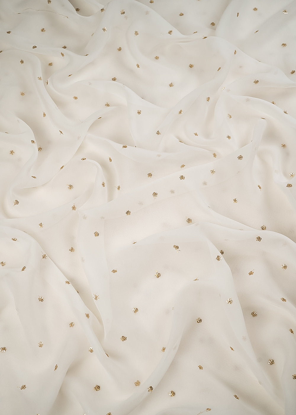 White Dyeable Georgette Fabric With All Over Buti Of Zari And Sequins Work 24535