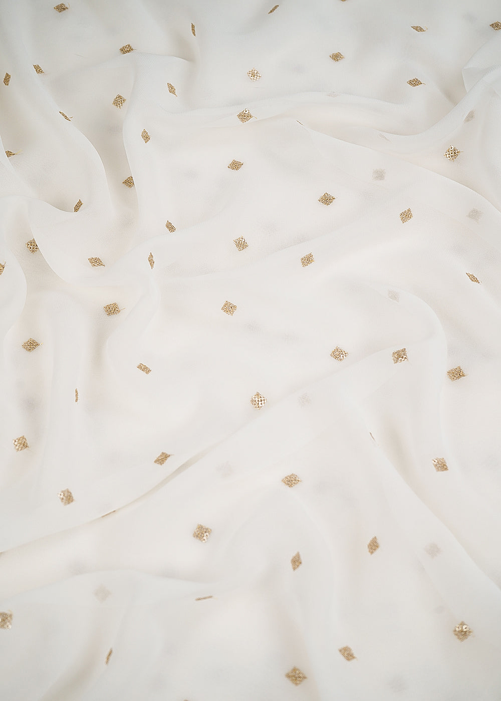 White Dyeable Georgette Fabric With All Over Buti Of Zari And Sequins Work 24536