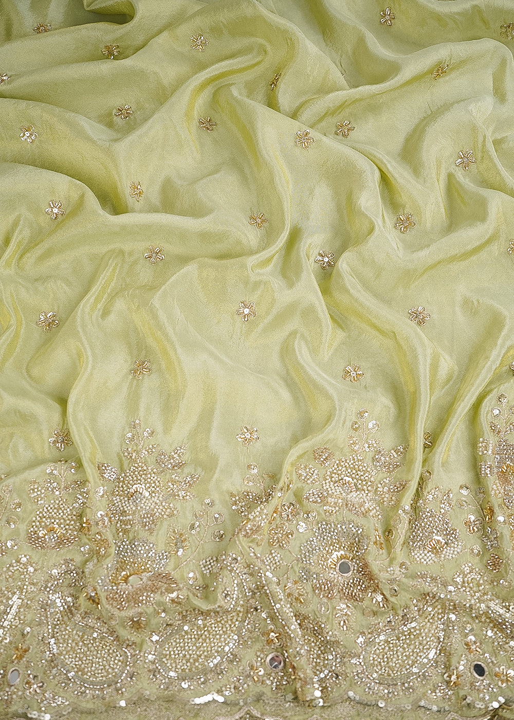 Pista Green Tissue Fabric With All Over Zari, Sequins, Katdana, Bead And Faux Mirror Work With One Side Heavy Border 24546