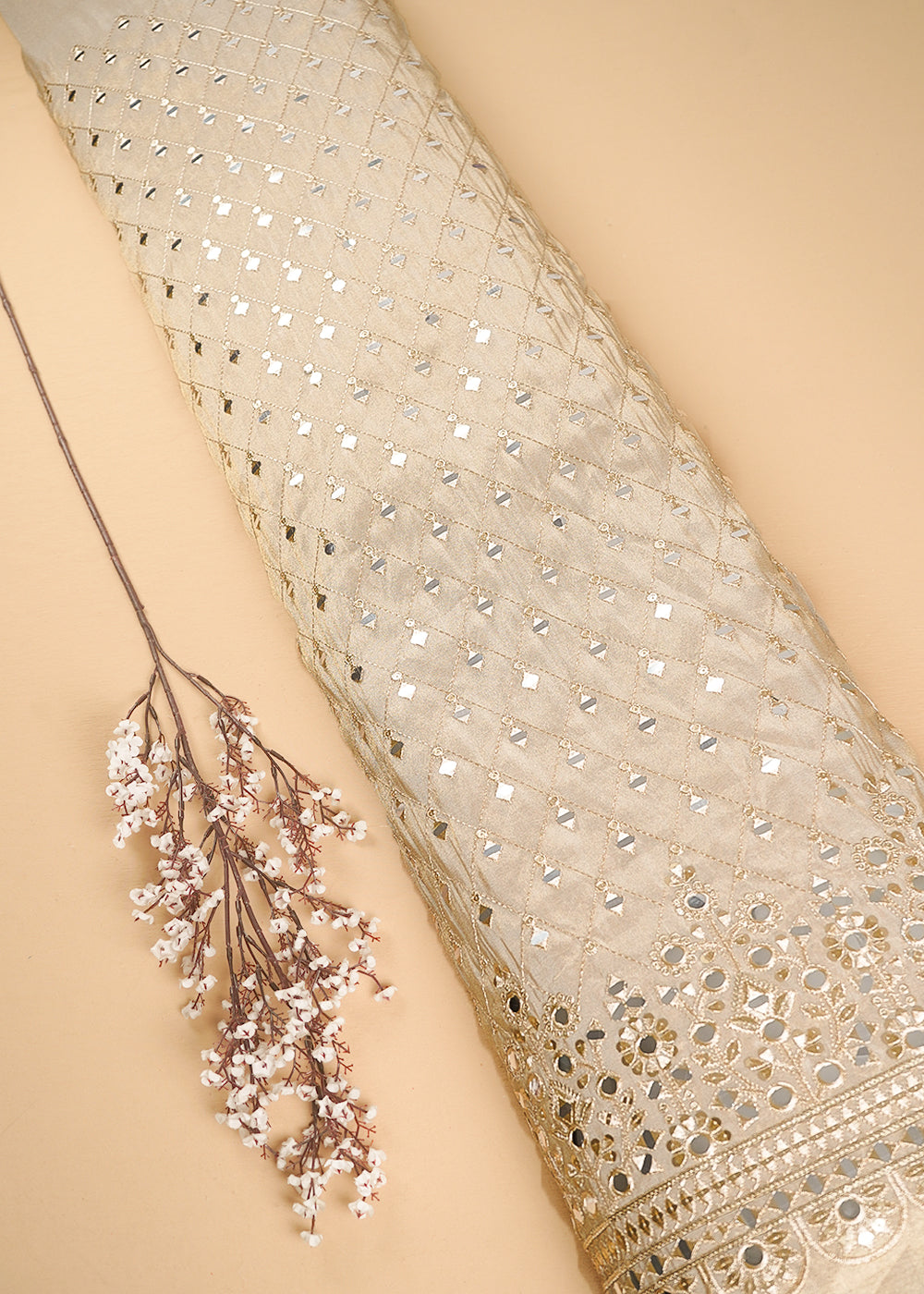 Golden Dyeable Tissue Fabric With All Over Zari, Sequins And Faux Mirror Work With One Side Heavy Border 24629