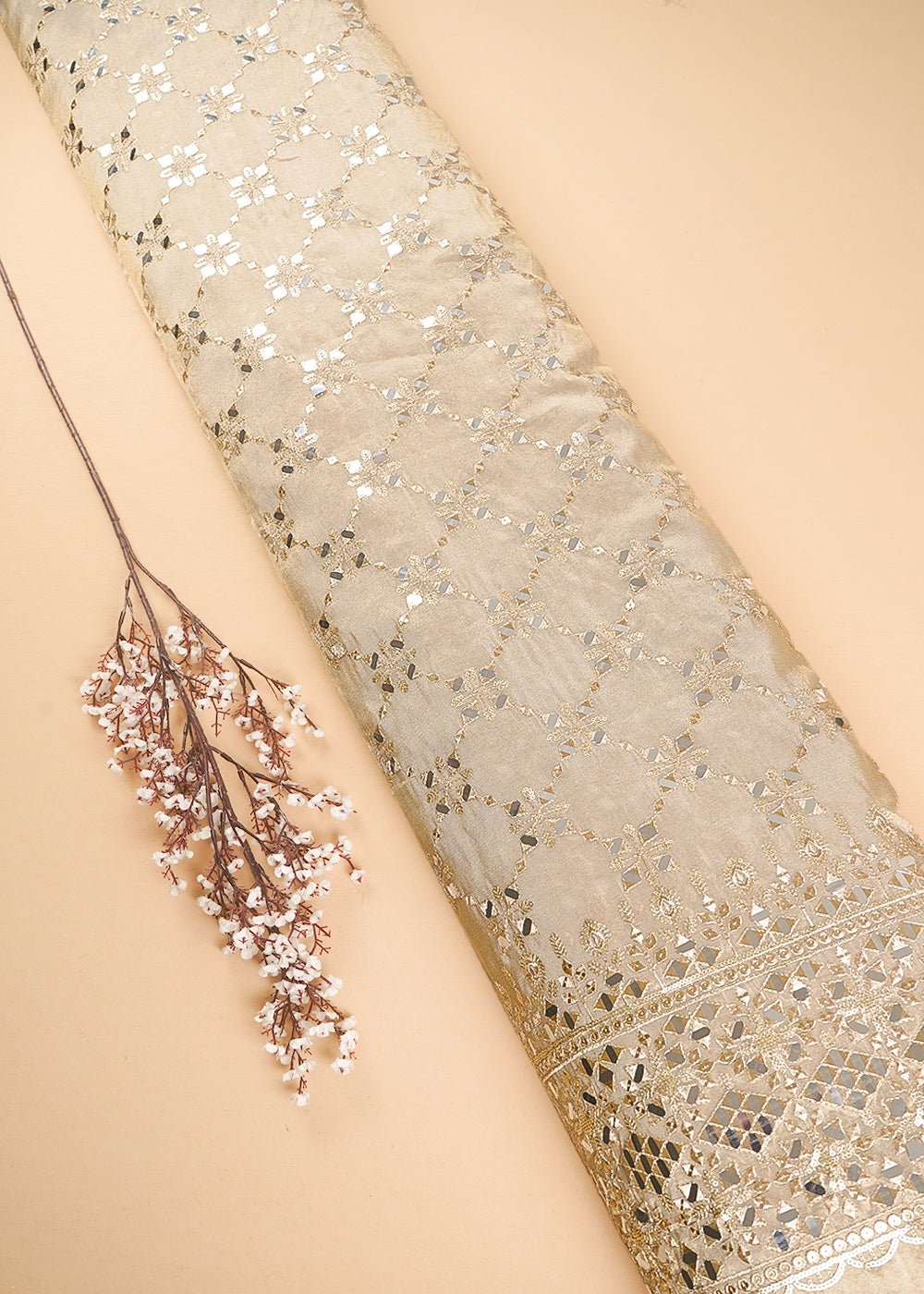 Golden Dyeable Tissue Fabric With All Over Zari, Sequins And Faux Mirror Work With One Side Heavy Border 24630