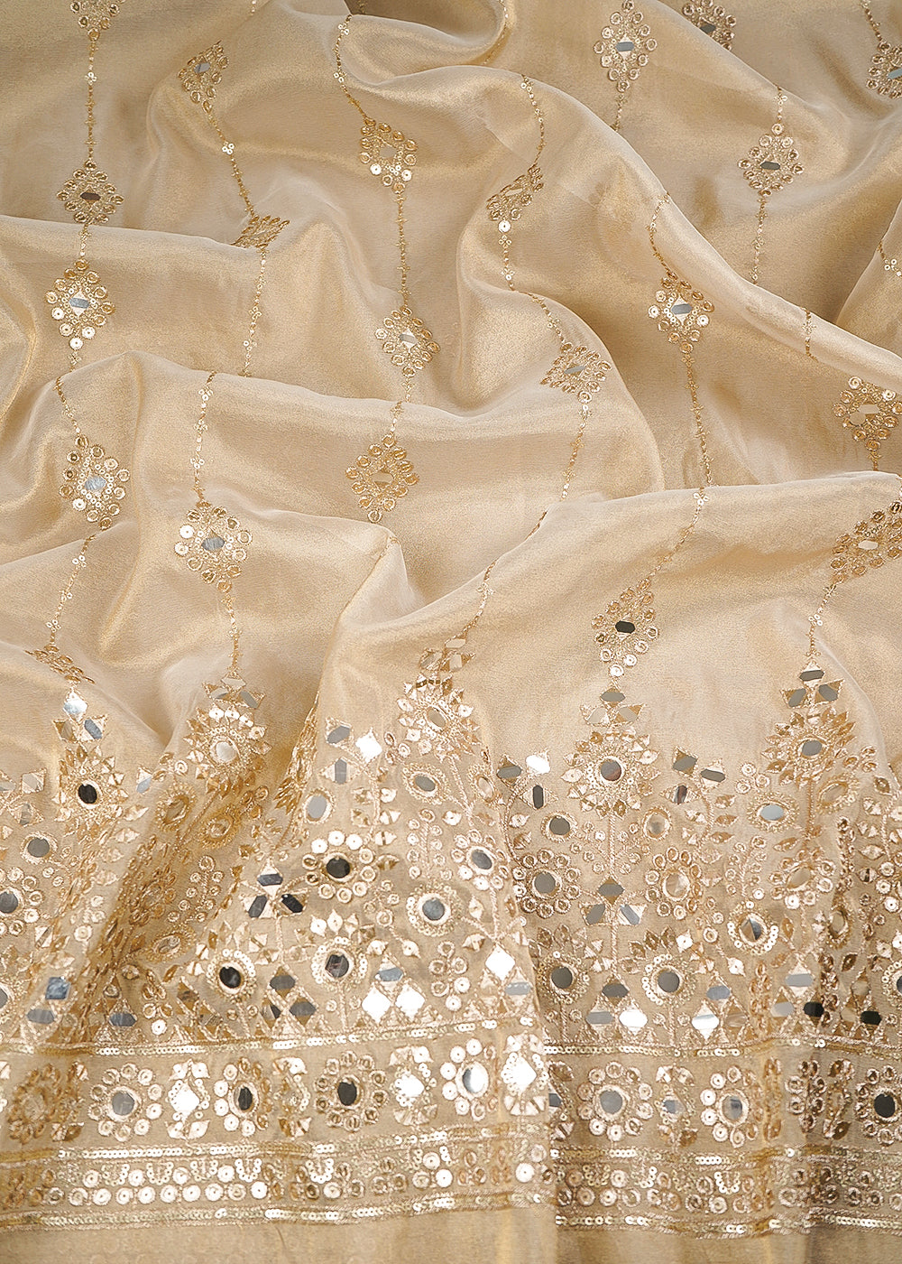 Golden Dyeable Tissue Fabric With All Over Zari, Sequins And Faux Mirror Work With One Side Heavy Border 24631