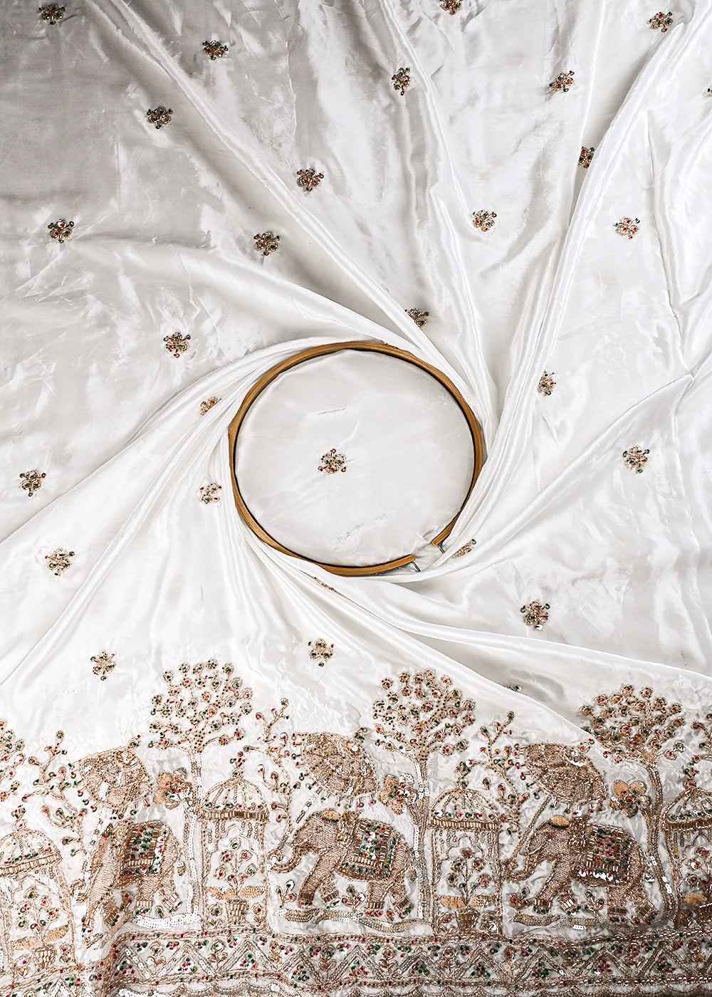 White Dyeable Crepe Fabric With All Over Zari, Sequins And Katdana Work With One Side Heavy Border 24740
