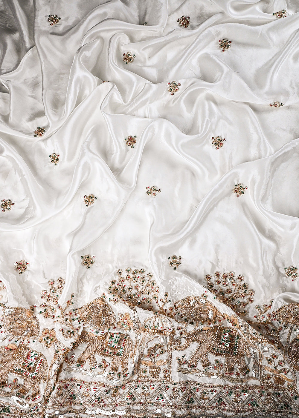 White Dyeable Crepe Fabric With All Over Zari, Sequins And Katdana Work With One Side Heavy Border 24740