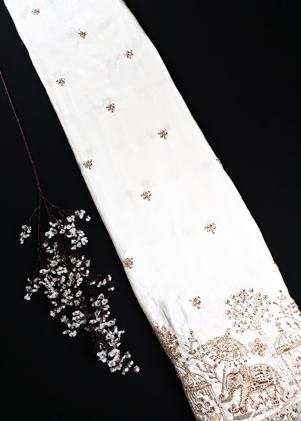 White Dyeable Crepe Fabric With All Over Zari, Sequins And Katdana Work With One Side Heavy Border 24740