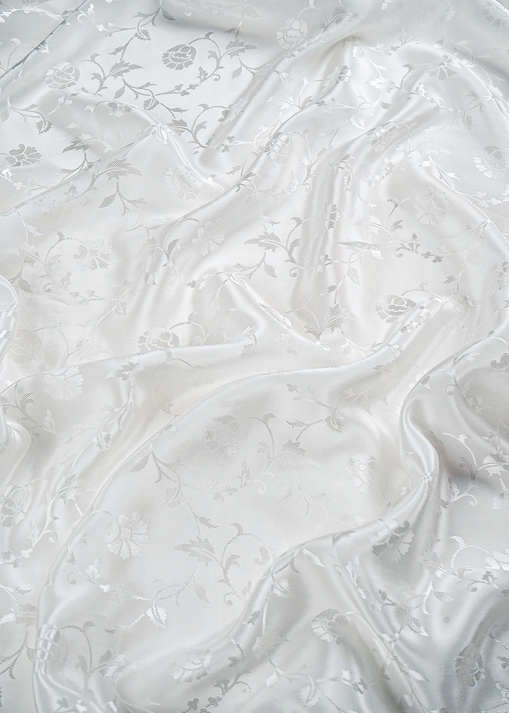 White Dyeable Silk Fabric With All Over Thread Work 24884