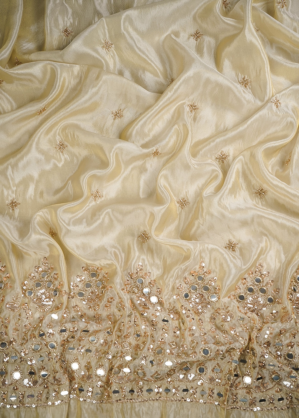 Golden Dyeable Tissue Fabric With All Over Zari, Sequins, Katdana, Bead And Faux Mirror Work With One Side Heavy Border 25002