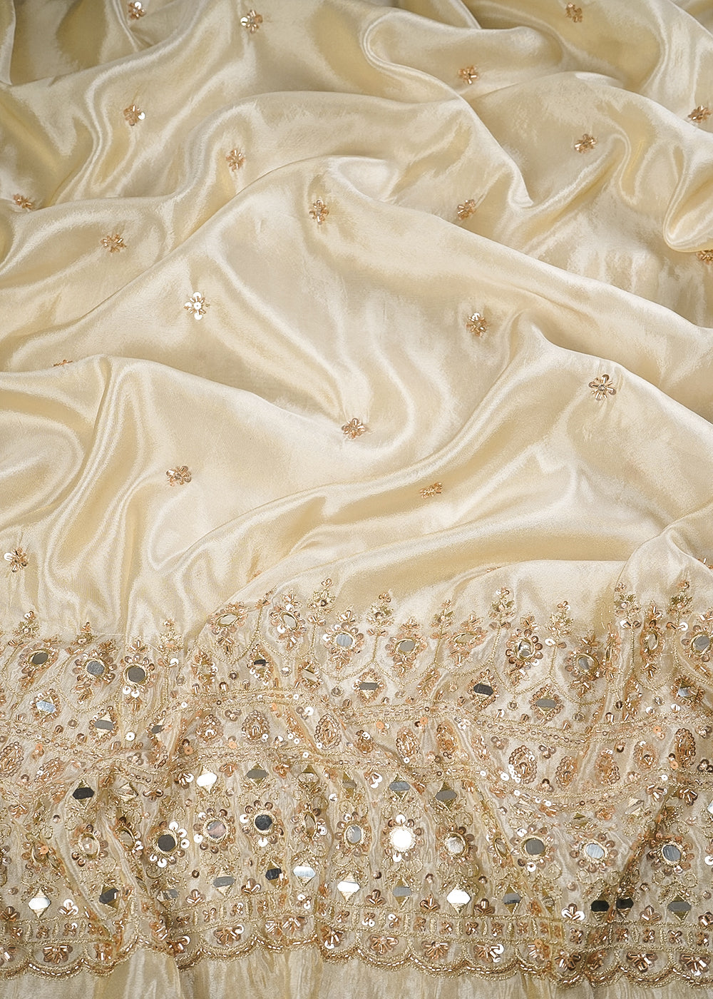 Golden Dyeable Tissue Fabric With All Over Zari, Sequins, Katdana, Bead And Faux Mirror Work With One Side Heavy Border 25003