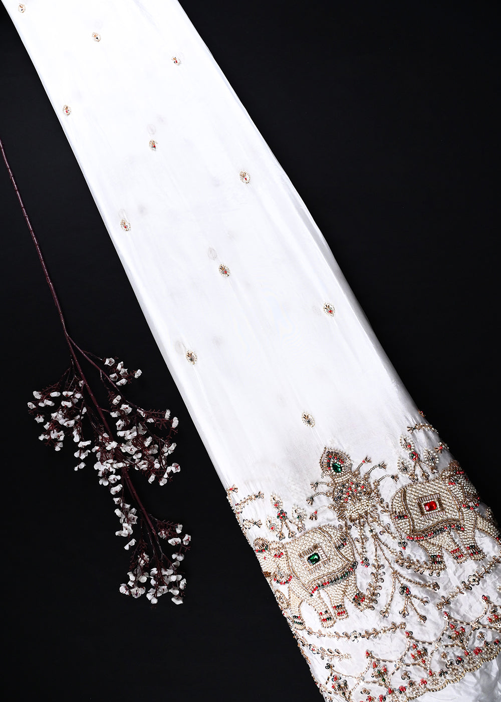 White Dyeable Crepe Fabric With All Over Zari, Sequins, Katdana And Stone Work With One Side Heavy Border 25666
