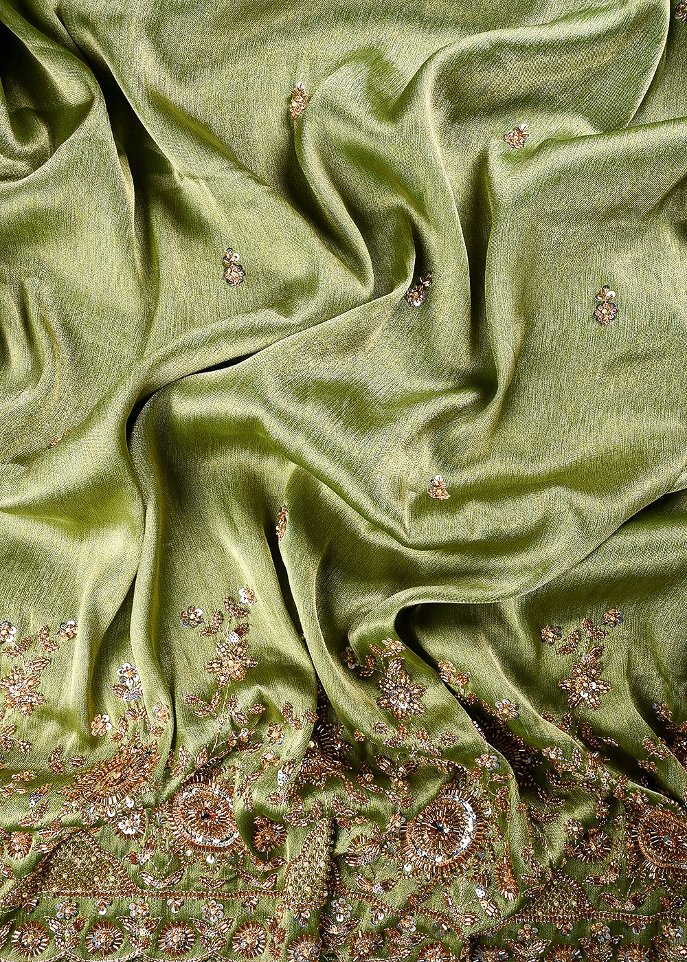 Green Tissue Fabric With All Over Zari, Sequins, Katdana And Stone Work With One Side Border 25668