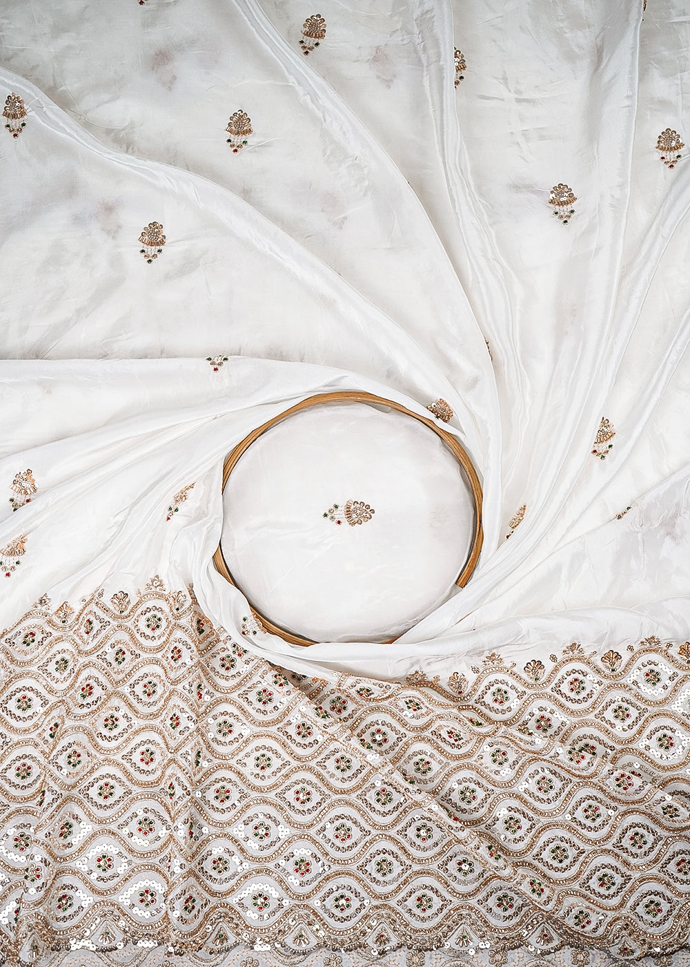 White Dyeable Crepe Fabric With All Over Zari, Sequins And Katdana Work With One Side Heavy Border 25677