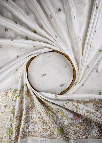 White Dyeable Silk Fabric With All Over Thread And Zari Handloom With One Side Border 25943