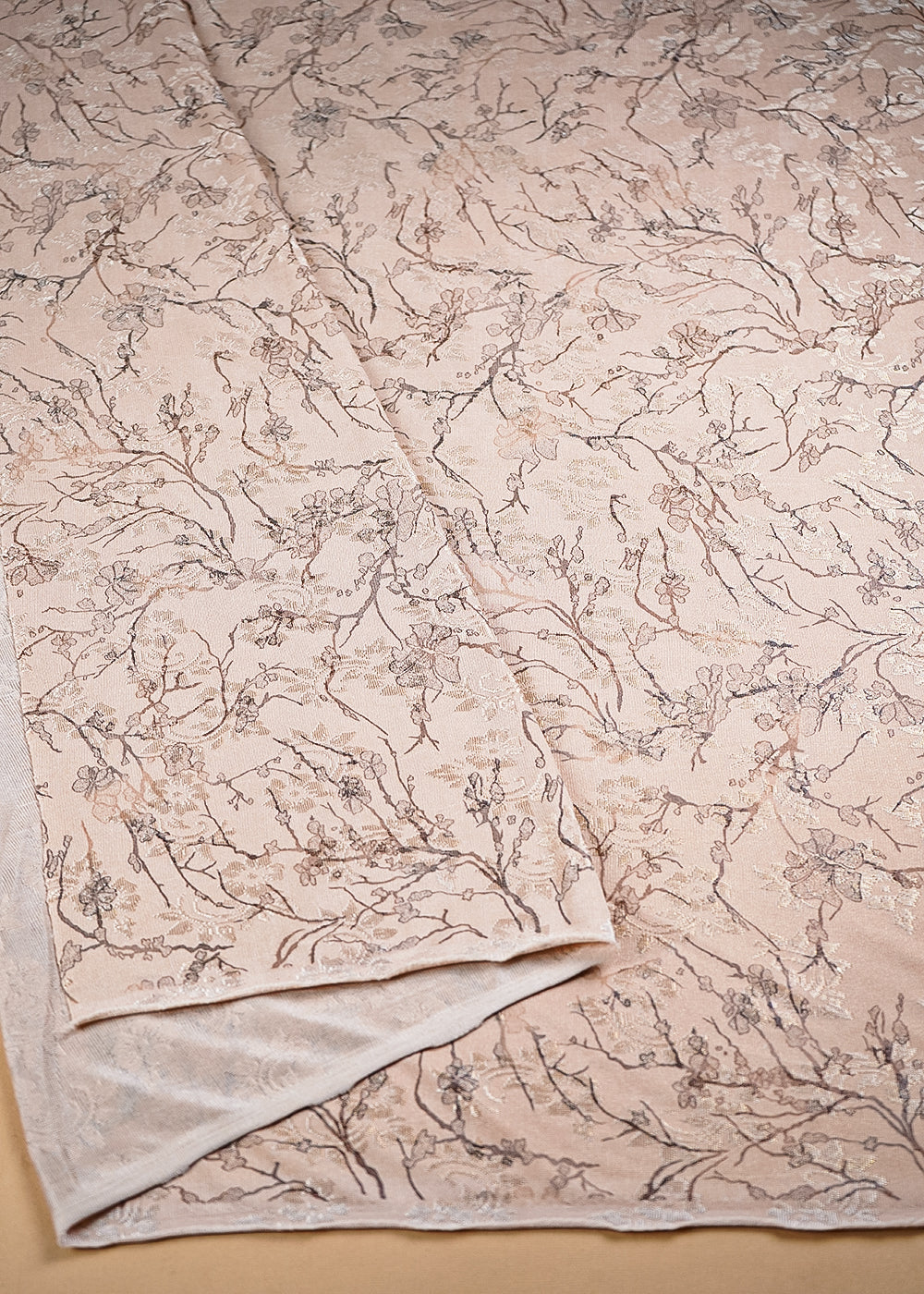 Peach Imported Lycra Fabric With All Over Thread And Foil Work 26440