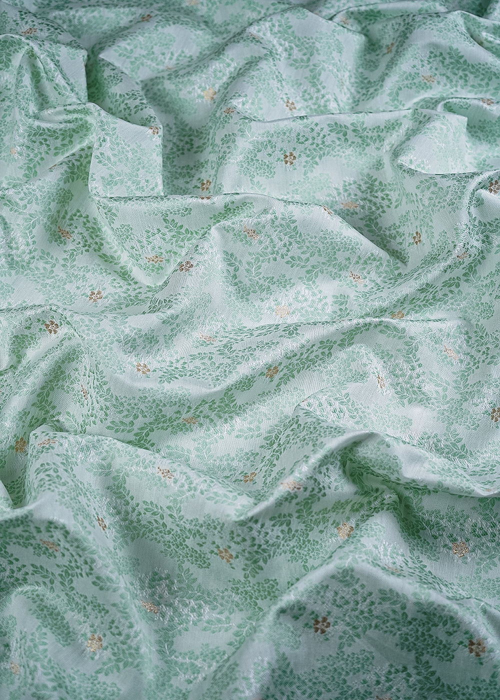 White Cotton Silk Fabric With All Over Mint Green Thread And Zari Handloom 26486