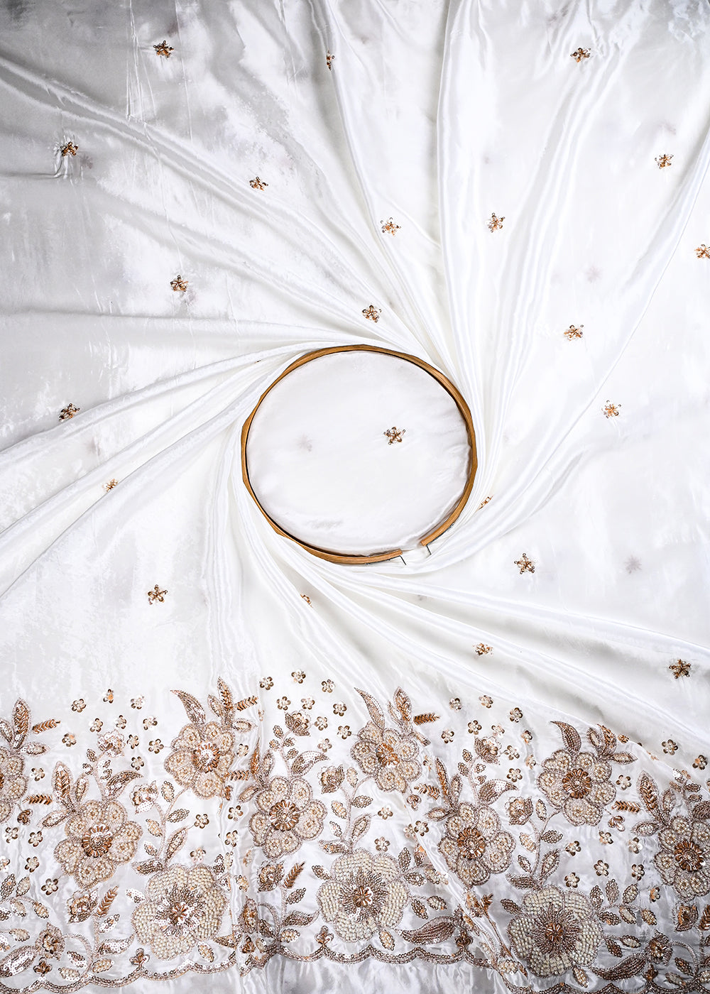 White Dyeable Crepe Fabric With All Over Zari, Sequins, Katdana And Bead Work With One Side Heavy Border 27033